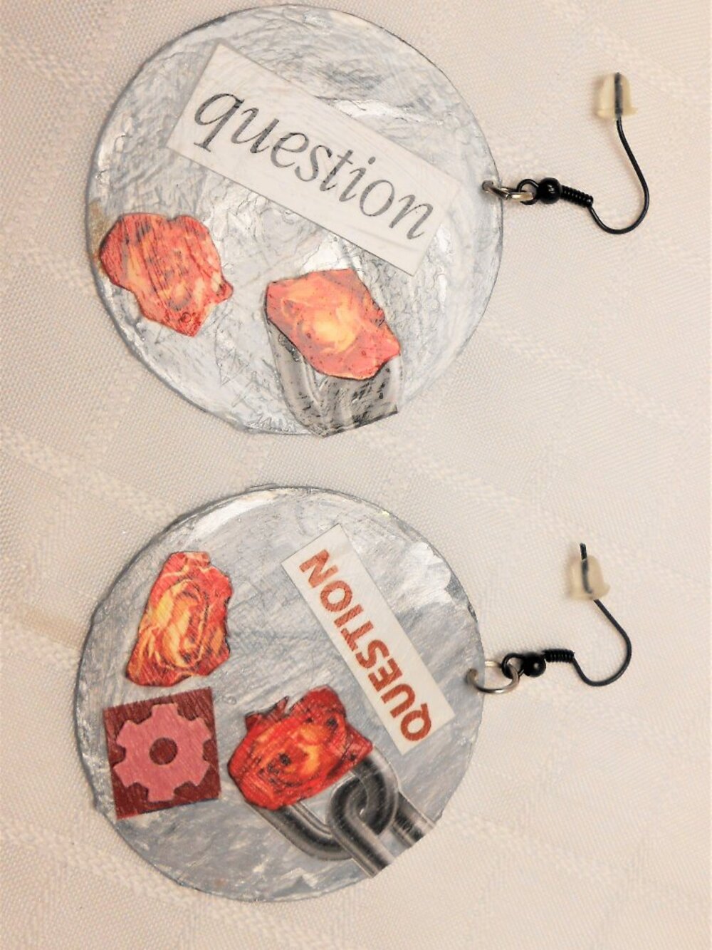 Handmade collages on earrings